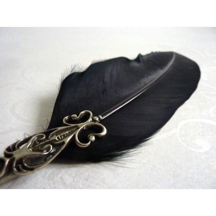 Pluma, tintero y portalápices