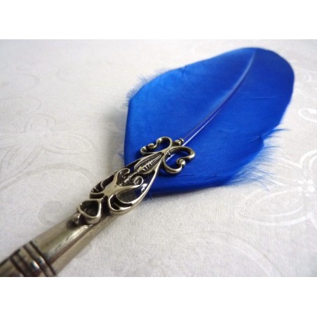 Pluma, tintero y portalápices