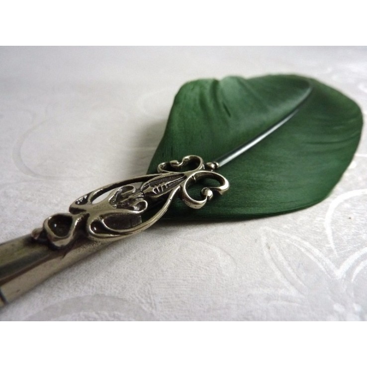 Pluma, tintero y portalápices