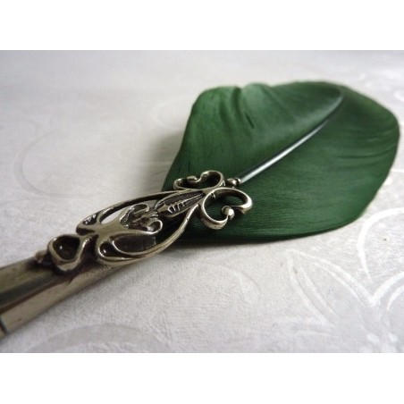 Pluma, tintero y portalápices