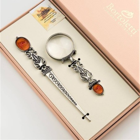 Suurennuslasi & Kirjeenavaaja - Dandalo