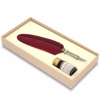 Feather quill pen and ink